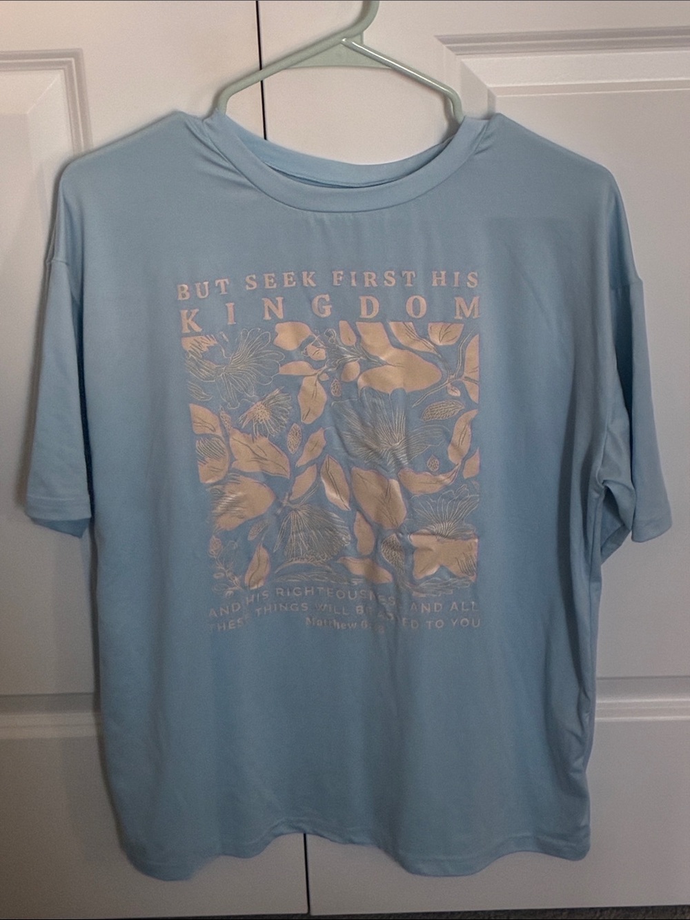 Women’s like new blue Christian shirt